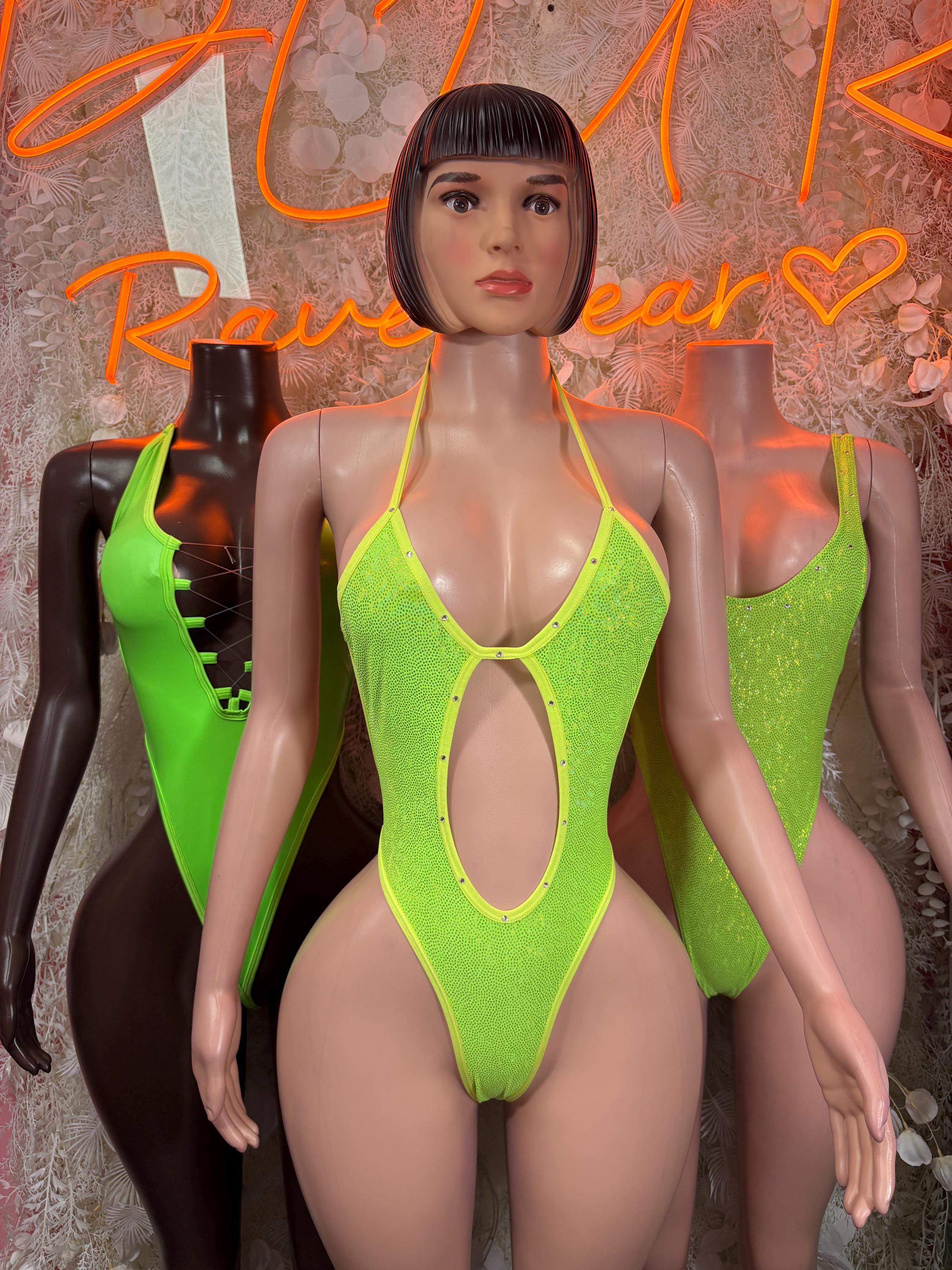 Neon green metallic halter bodysuit with oval cutout and strappy backless design