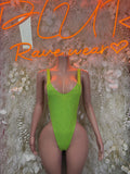 Neon green metallic one-piece bodysuit with halter neckline and high-cut leg openings