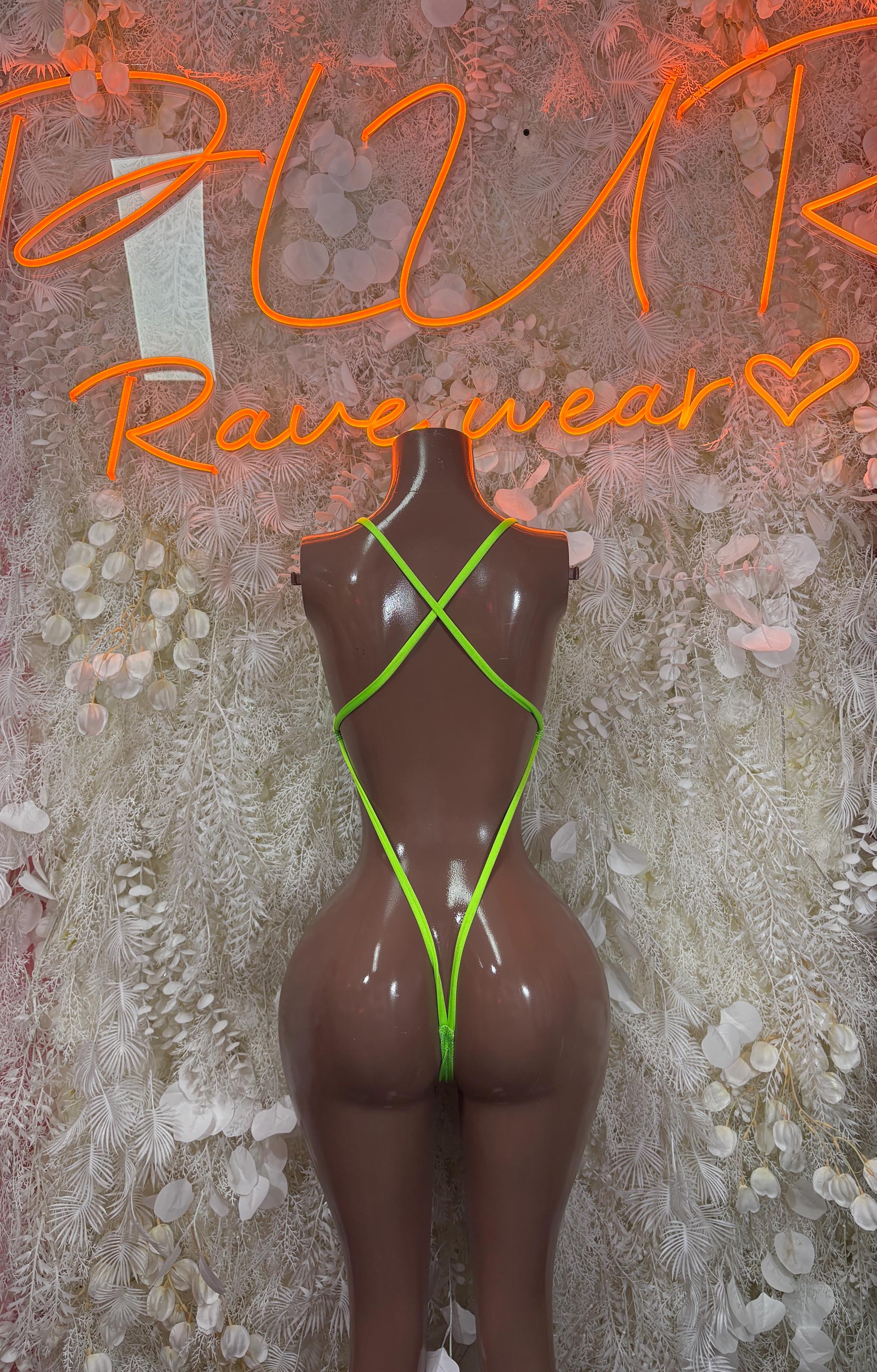Neon green sequin bodysuit with back cross straps, high-cut one-piece