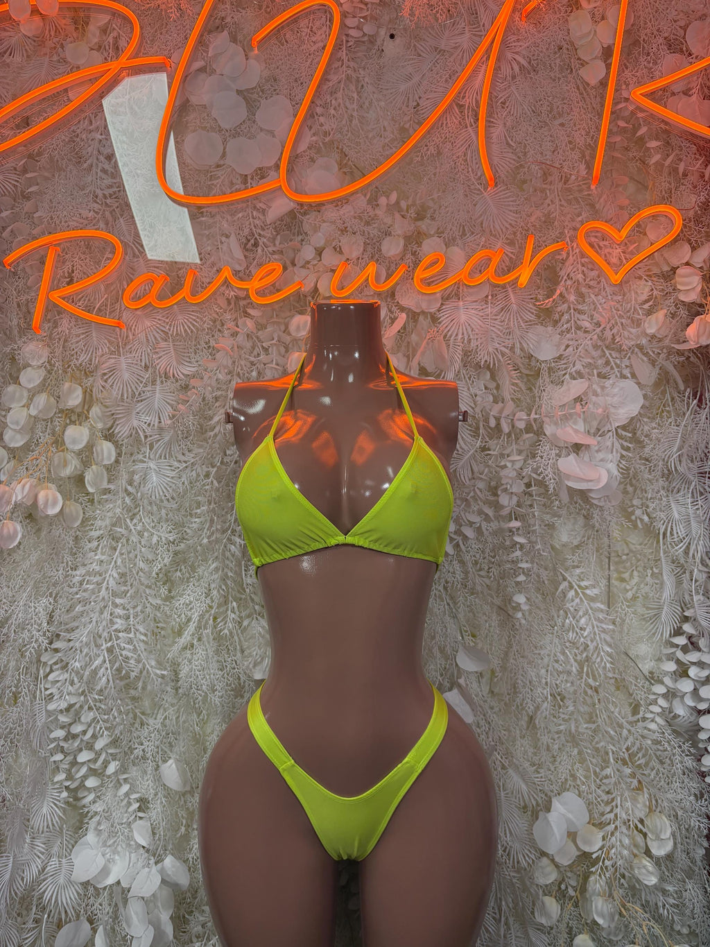 Neon green triangle bikini set with tie-neck top and high-leg bottoms