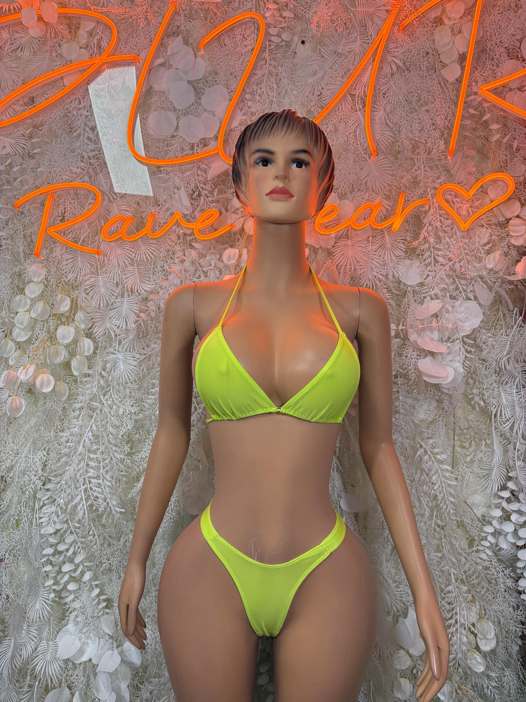 Neon green triangle bikini set with tie straps and matching high-cut bottoms