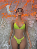 Neon green triangle bikini set with tie straps and matching high-cut bottoms