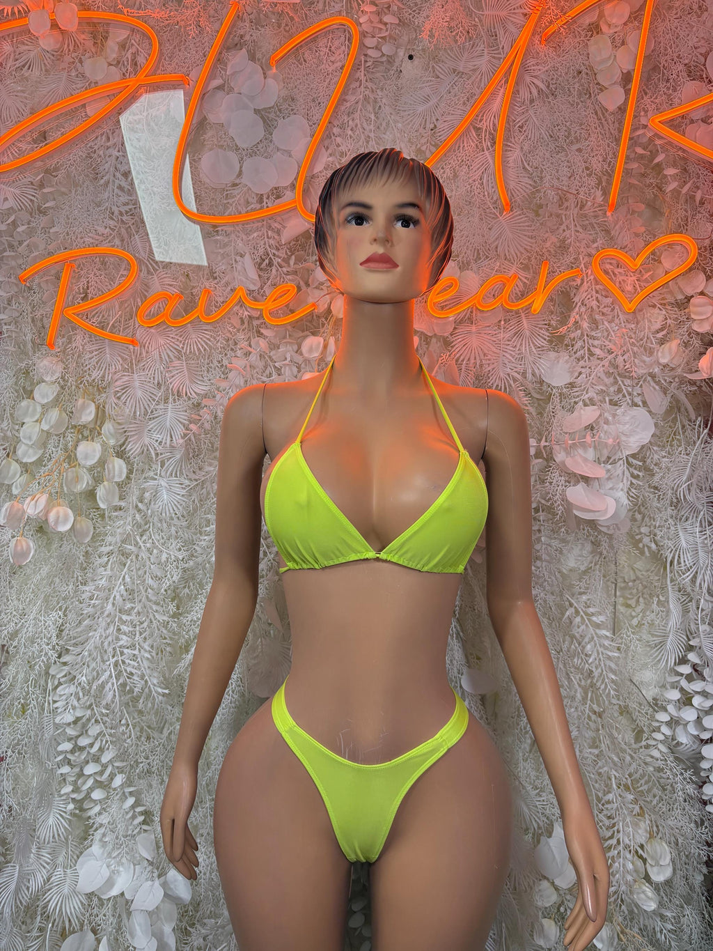 Neon green triangle bikini set with matching high-cut bottoms