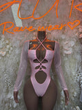 Baby pink long-sleeve bodysuit with lace-up chest cutout and hip straps