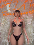 Black lace two-piece bikini with triangle bra and matching high-cut bottoms