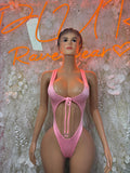 Baby pink one-piece dance bodysuit with tie-front cutout and low scoop back