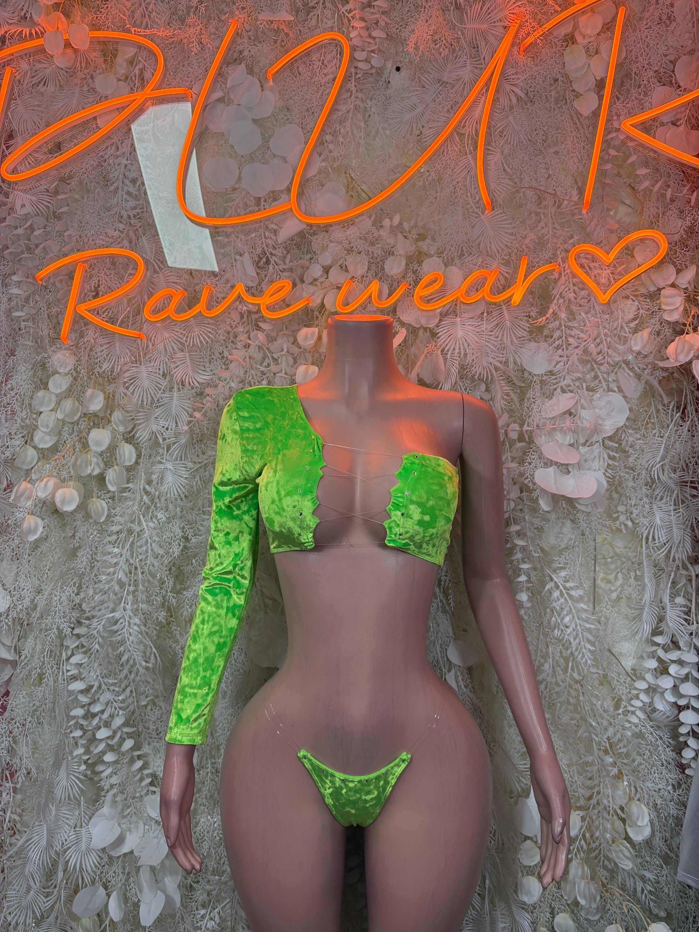 Green two-piece rave set with long-sleeve crop top and thong bikini bottoms