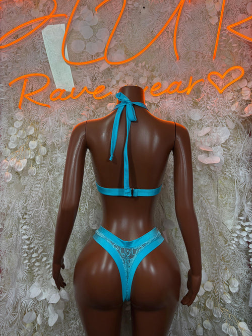 Blue lace bikini set with back halter tie and matching high-cut bottoms, back view