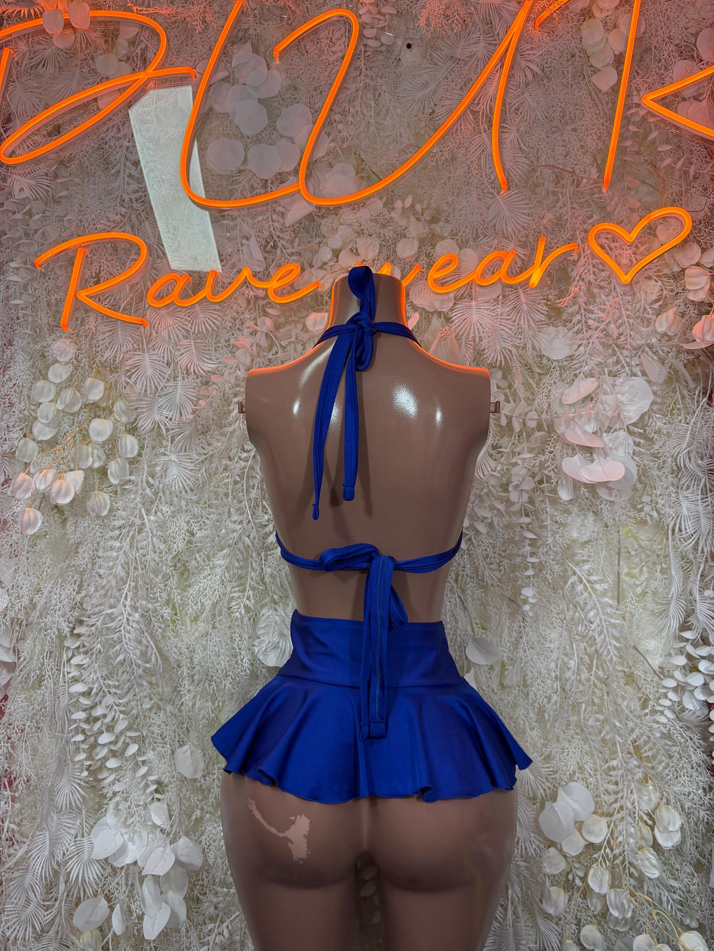 Blue backless two-piece with halter bra and tie-back layered mini skirt