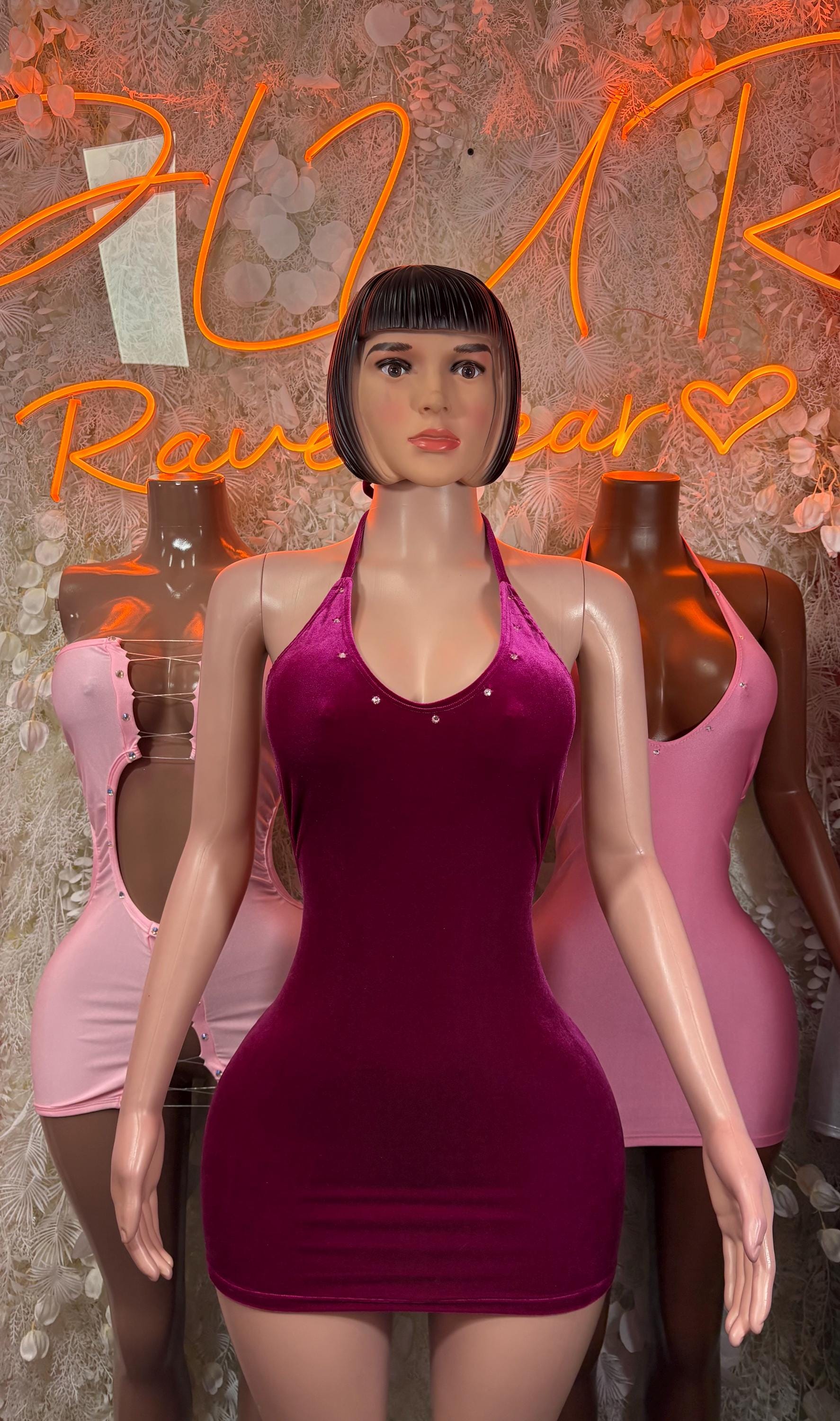 Purple sleeveless mini dress with scoop neckline, fitted body
