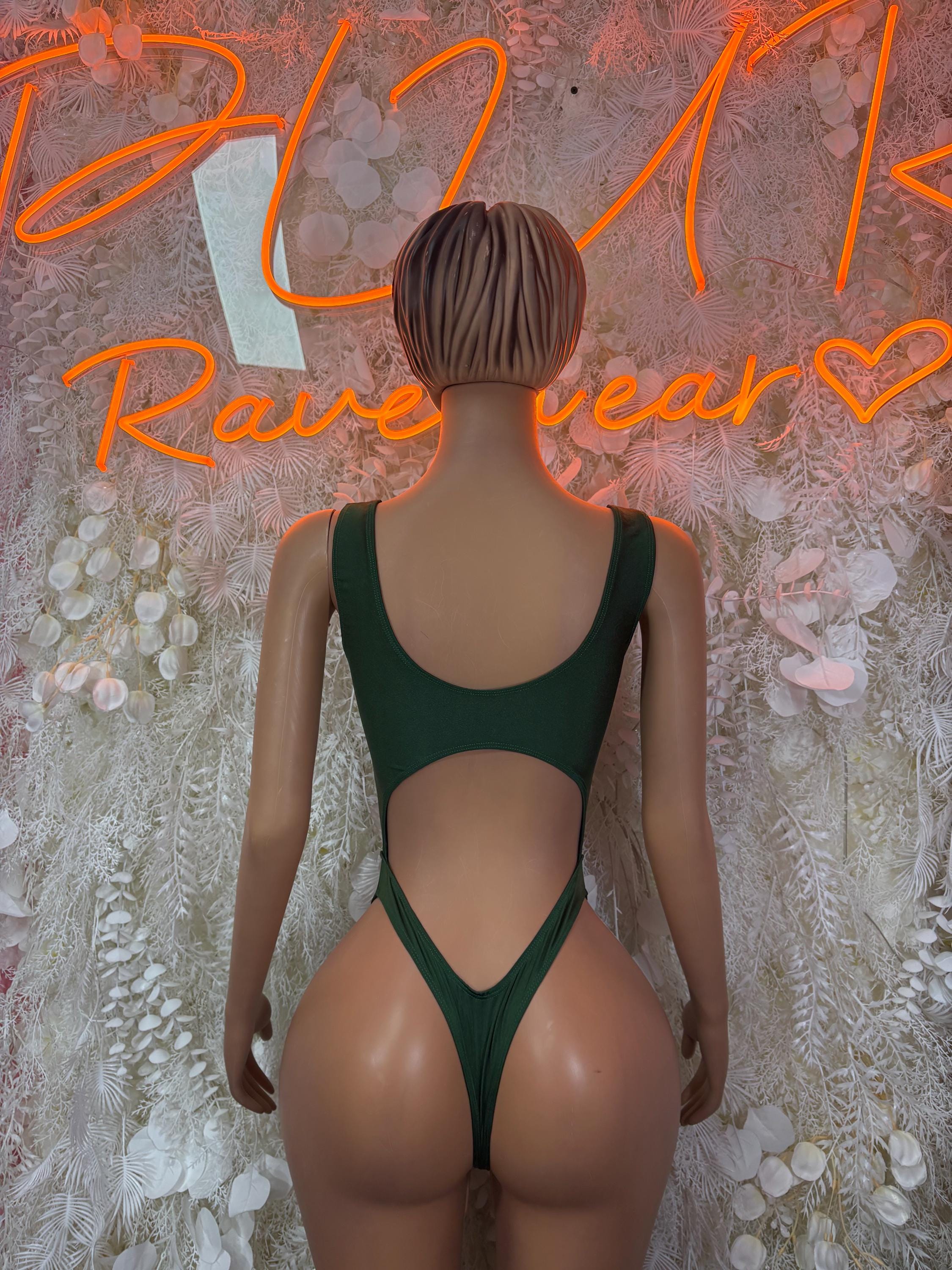 Green one-piece festival bodysuit with open back and V-shaped waist cut