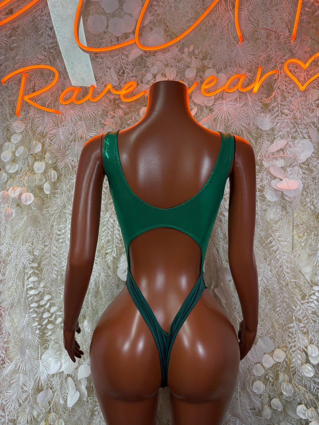 Green metallic bodysuit with low scoop back and narrow strap detail