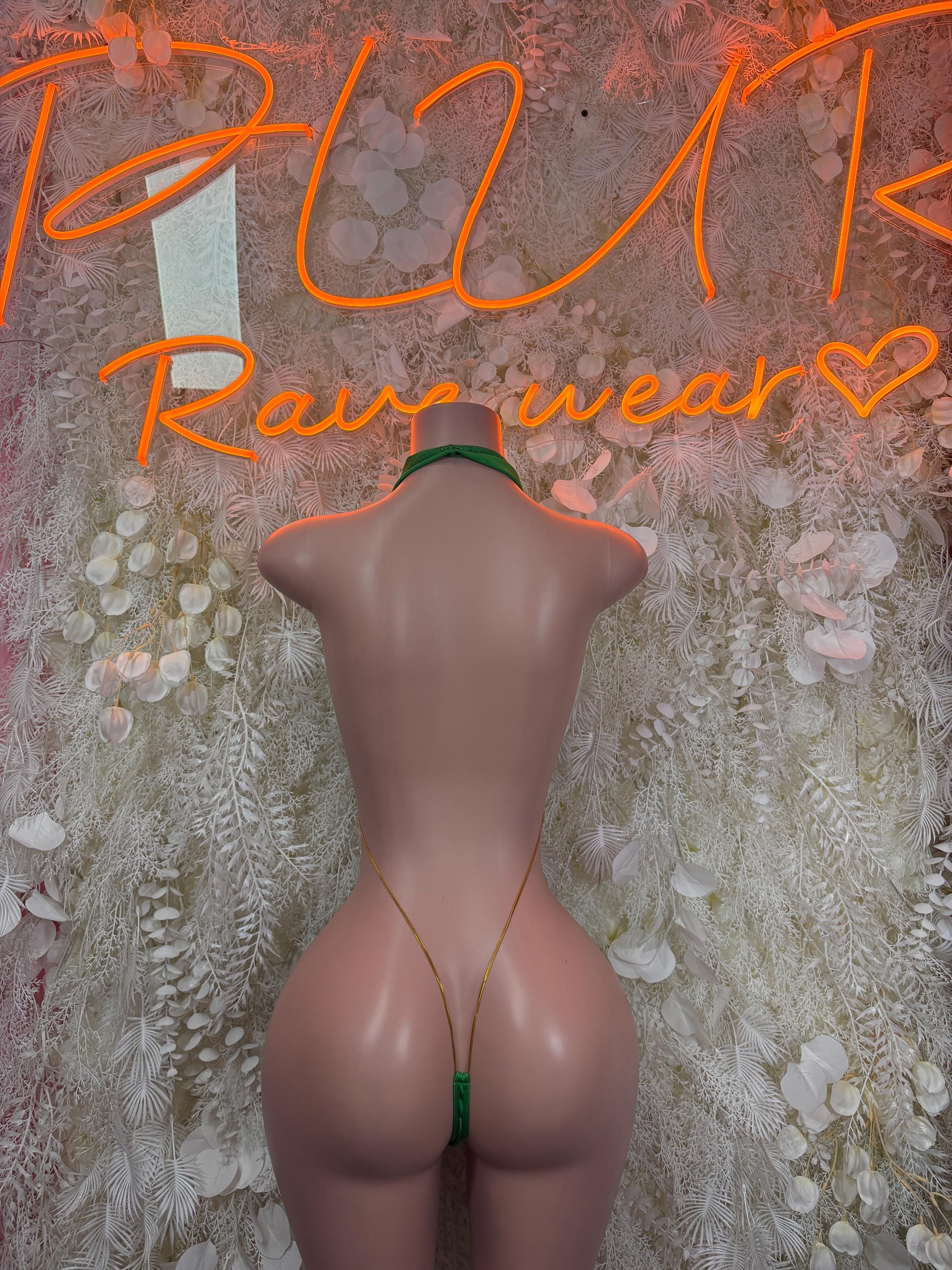 Back view of green slingshot bodysuit, backless V-neck with thong tie straps