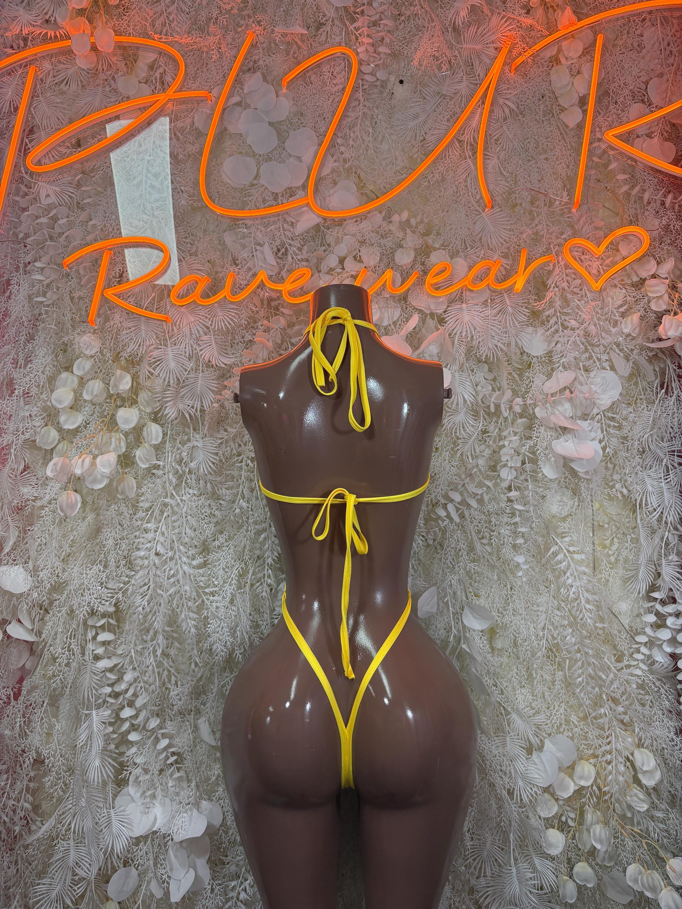 Yellow metallic bodysuit with tie halter straps and minimal front cutout