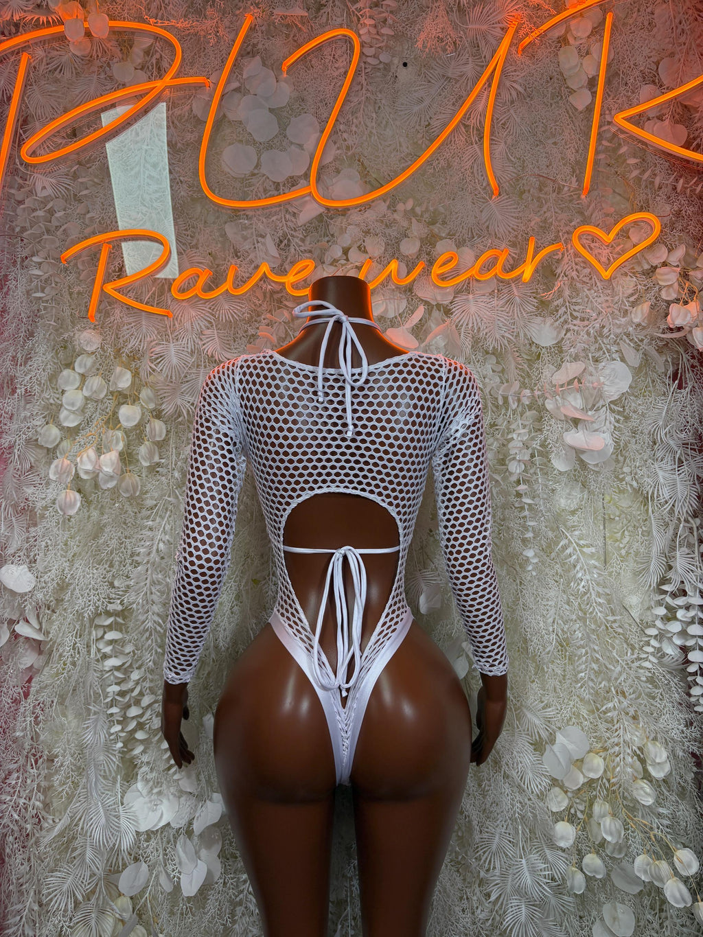 White fishnet bodysuit, open back with lace-up straps and long sleeves