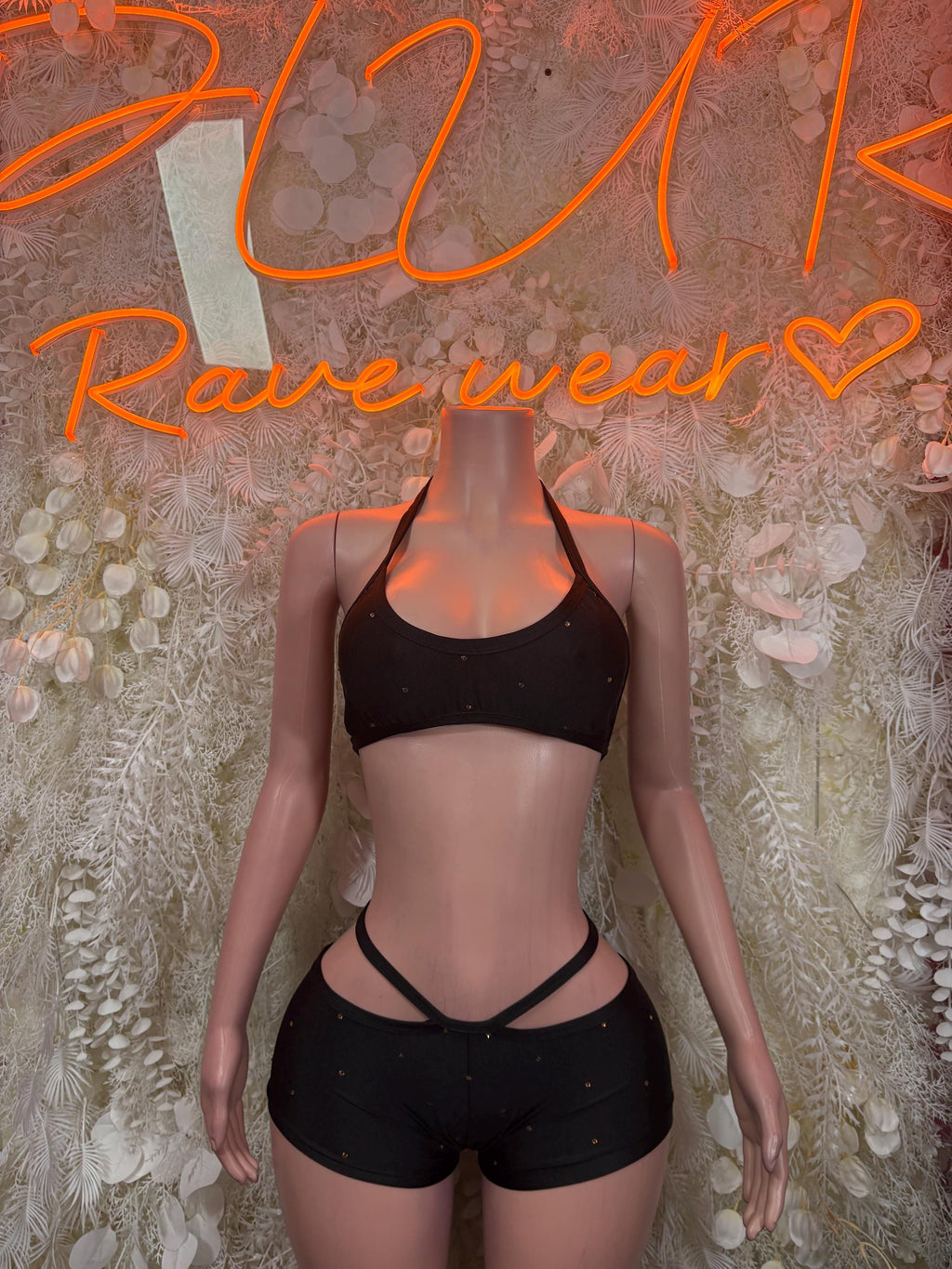 Black festival bodysuit set: strappy bra top and matching high-cut bottoms