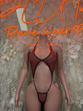 Burgundy glitter thong bodysuit with halter straps and cutout front