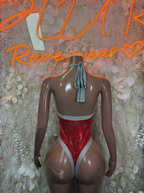Red glitter thong-style bodysuit with light blue trim and back tie detail