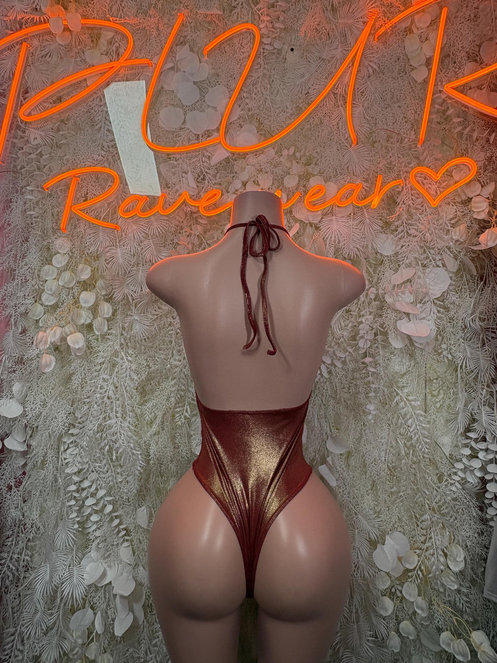 Burgundy bodysuit with back tie straps and cheeky high-cut leg