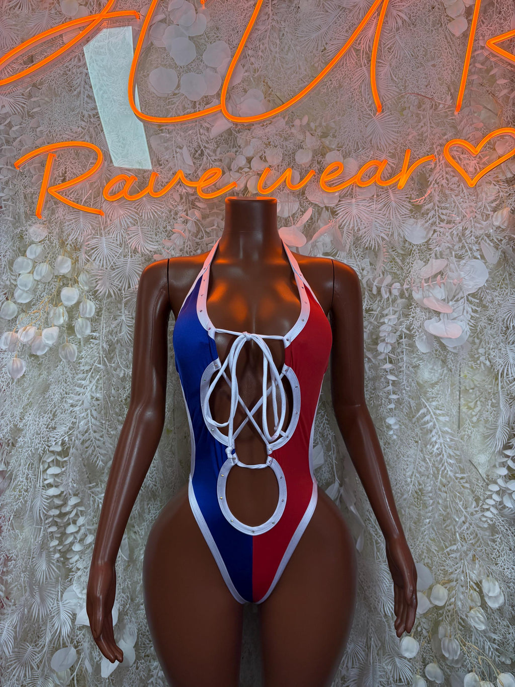 Dominican flag bodysuit with red, blue and white panels; lace-up front
