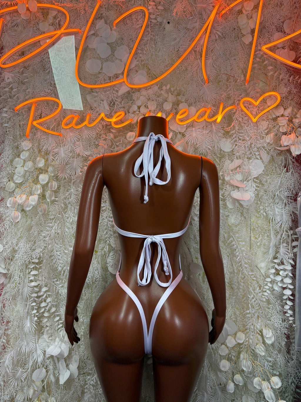 Dominican flag bodysuit back view with white lace-up straps and ties