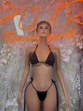 Black triangle bikini set with sparkly dots, adjustable ties, top and matching bottoms