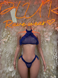 Royal blue two-piece bikini set with halter top and high-leg bottoms, ruffled accents.