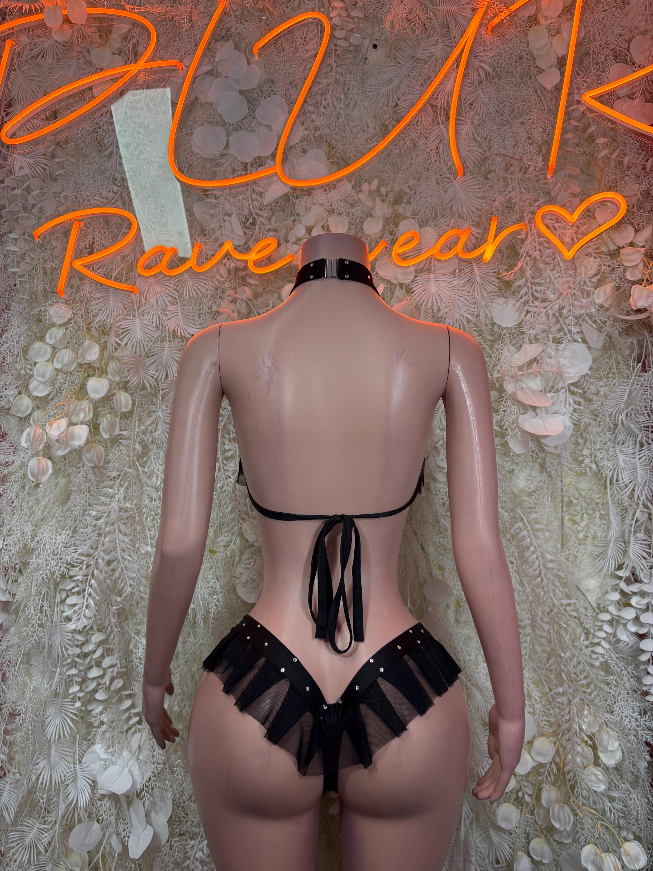 Black rave two-piece outfit, back view with strappy thong and tie ribbon detail