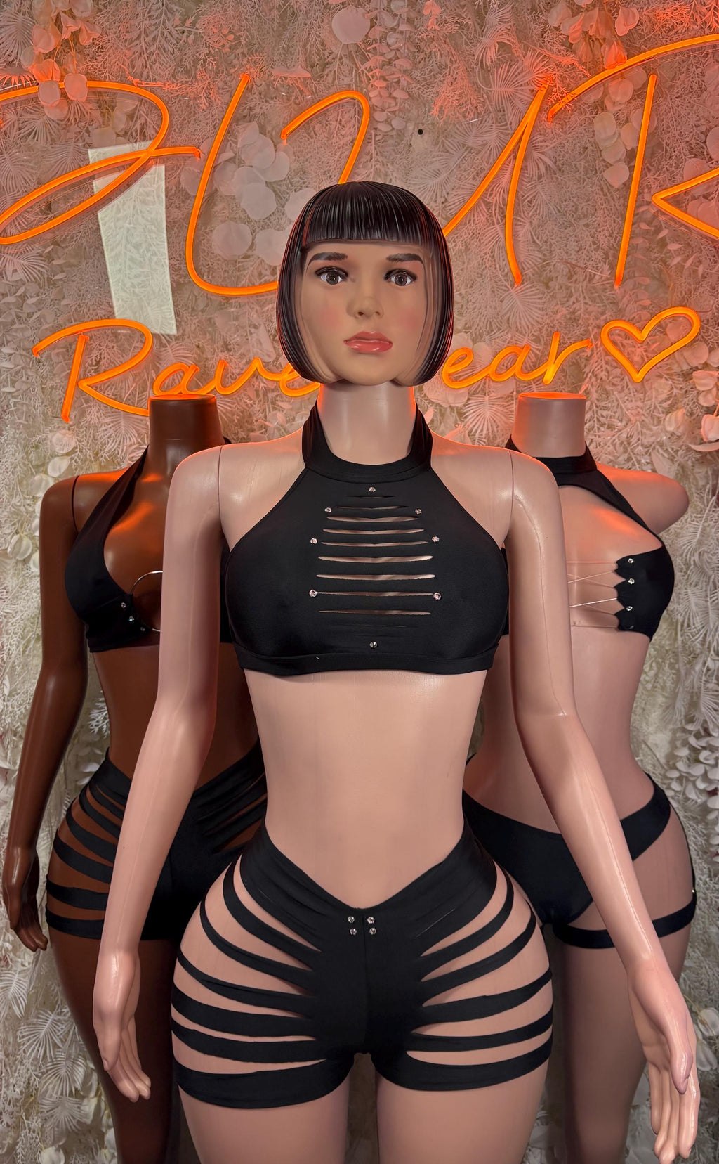 Black two-piece dancewear set: halter crop top with striped ribbing, cutout shorts