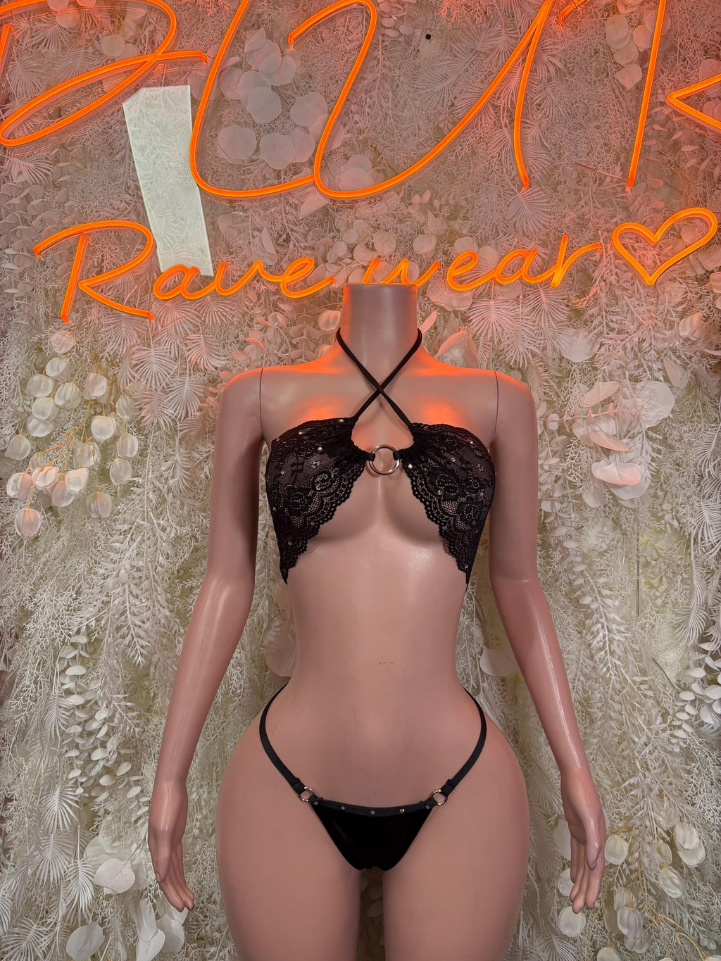 Black lace bikini set with halter bralette and thong bottoms, front strappy tie