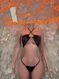 Black lace bikini set with halter bralette and thong bottoms, front strappy tie