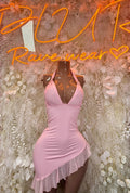 Light pink halter mini dress with V-neck, ruched bodice and layered ruffle hem