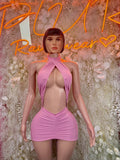 Pink halter mini dress with ruched bodice and open keyhole front