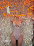 White fishnet bodysuit with deep V neckline and thong back, front view
