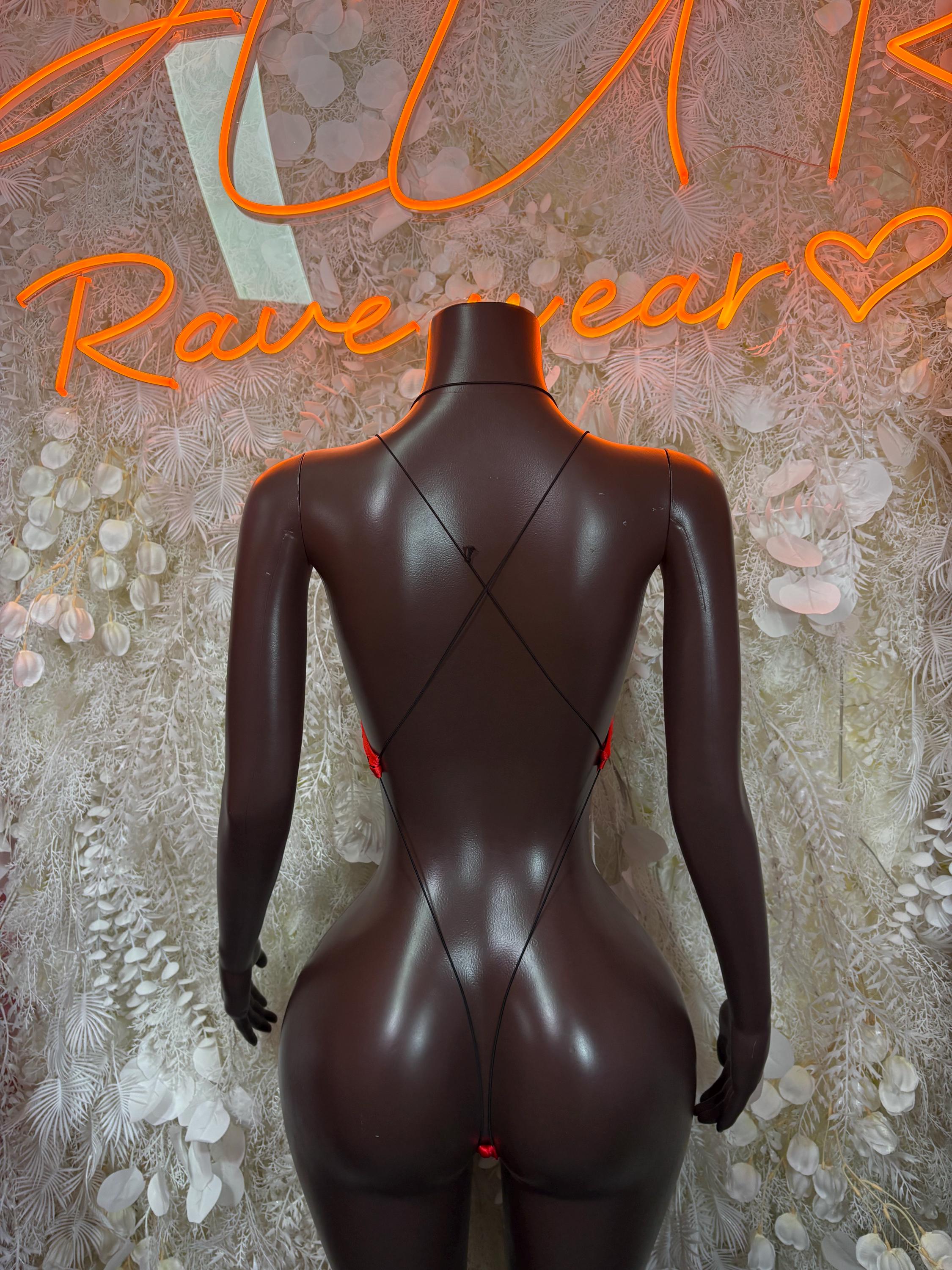 Black fishnet bodysuit with red trim, back view with X strap detail