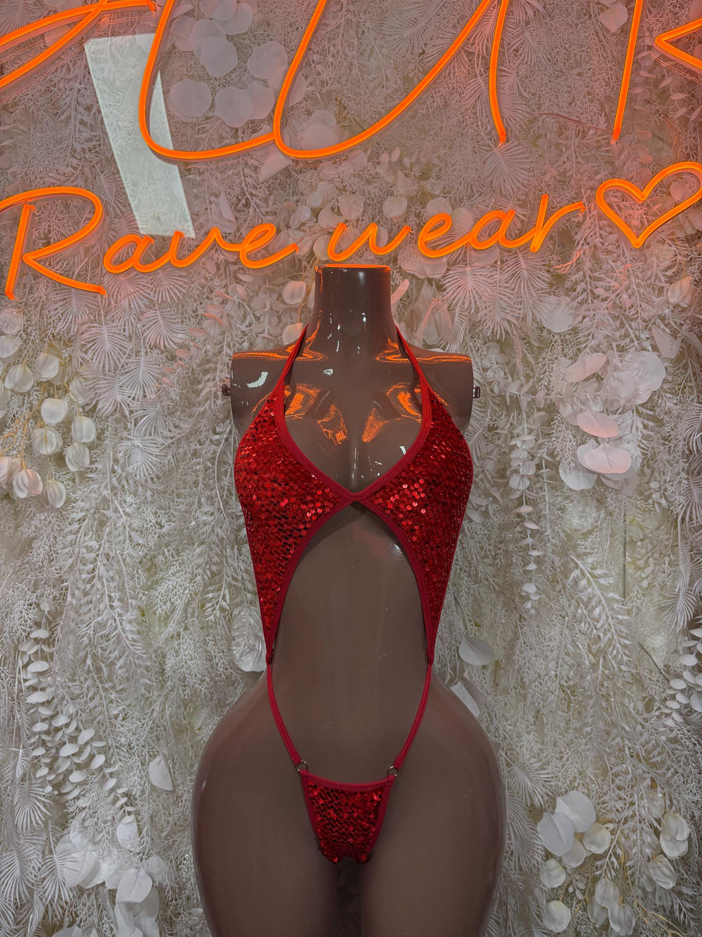 Red rhinestone one-piece bodysuit with keyhole cutout and ribbon tie front