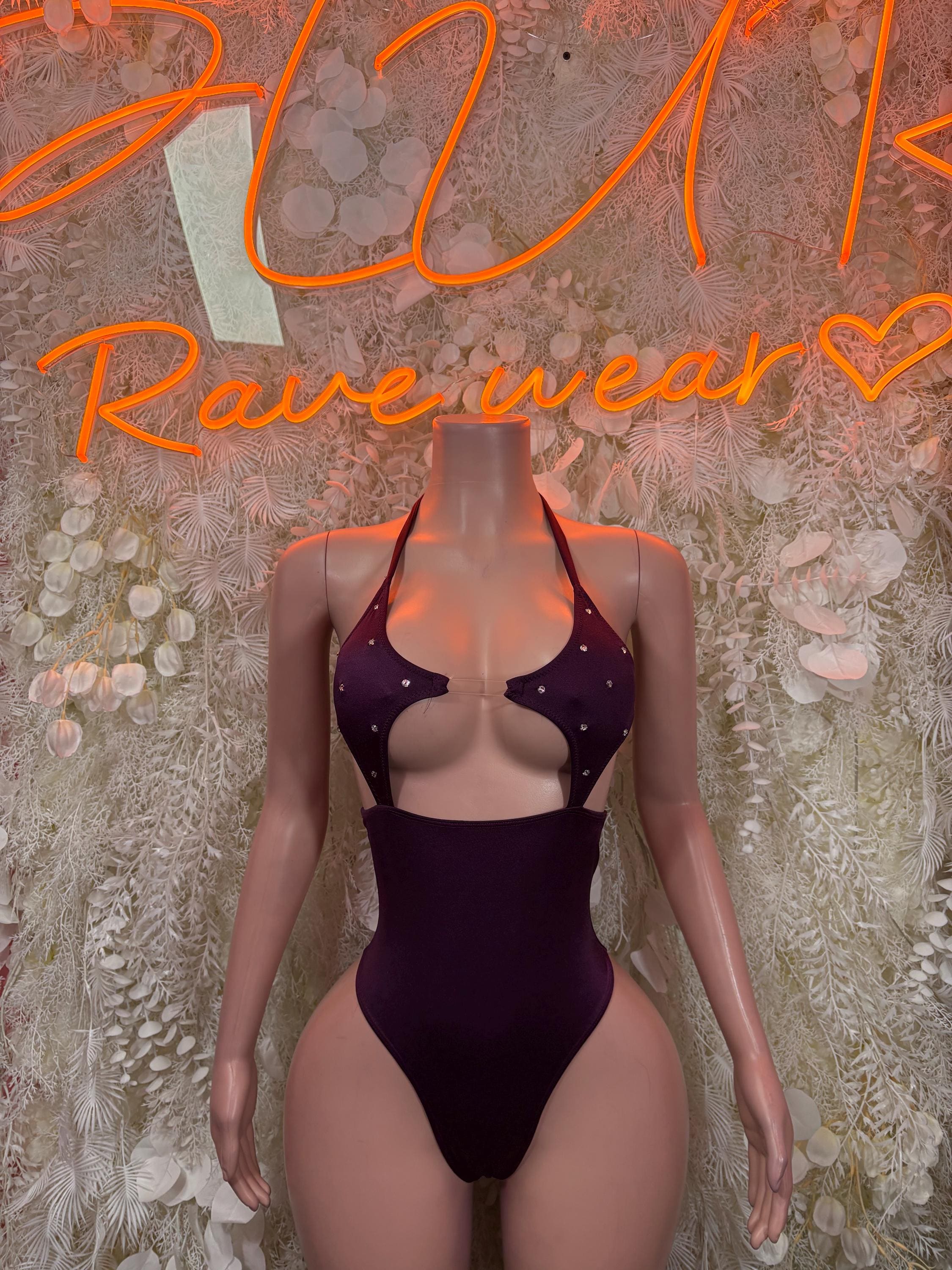Purple sleeveless bodysuit with halter neckline and starry cutout bra cups