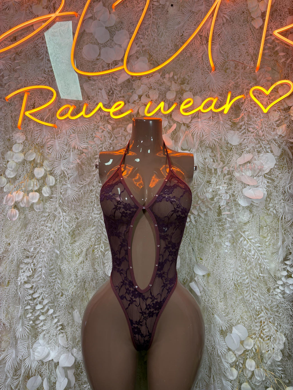 Purple lace festival bodysuit with sheer mesh panels and thong back, halter straps