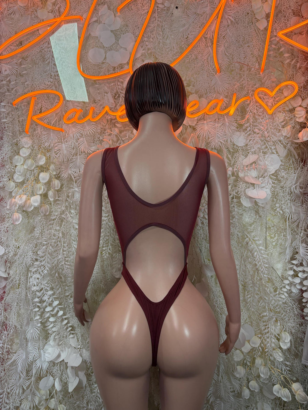 Burgundy open-back mesh bodysuit with crisscross straps and cheeky bottom