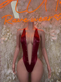 Burgundy sequin bodysuit with deep V neckline and front drape