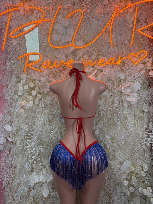 Back view of patriotic two-piece fringe outfit: blue triangle top with red ties and tassels