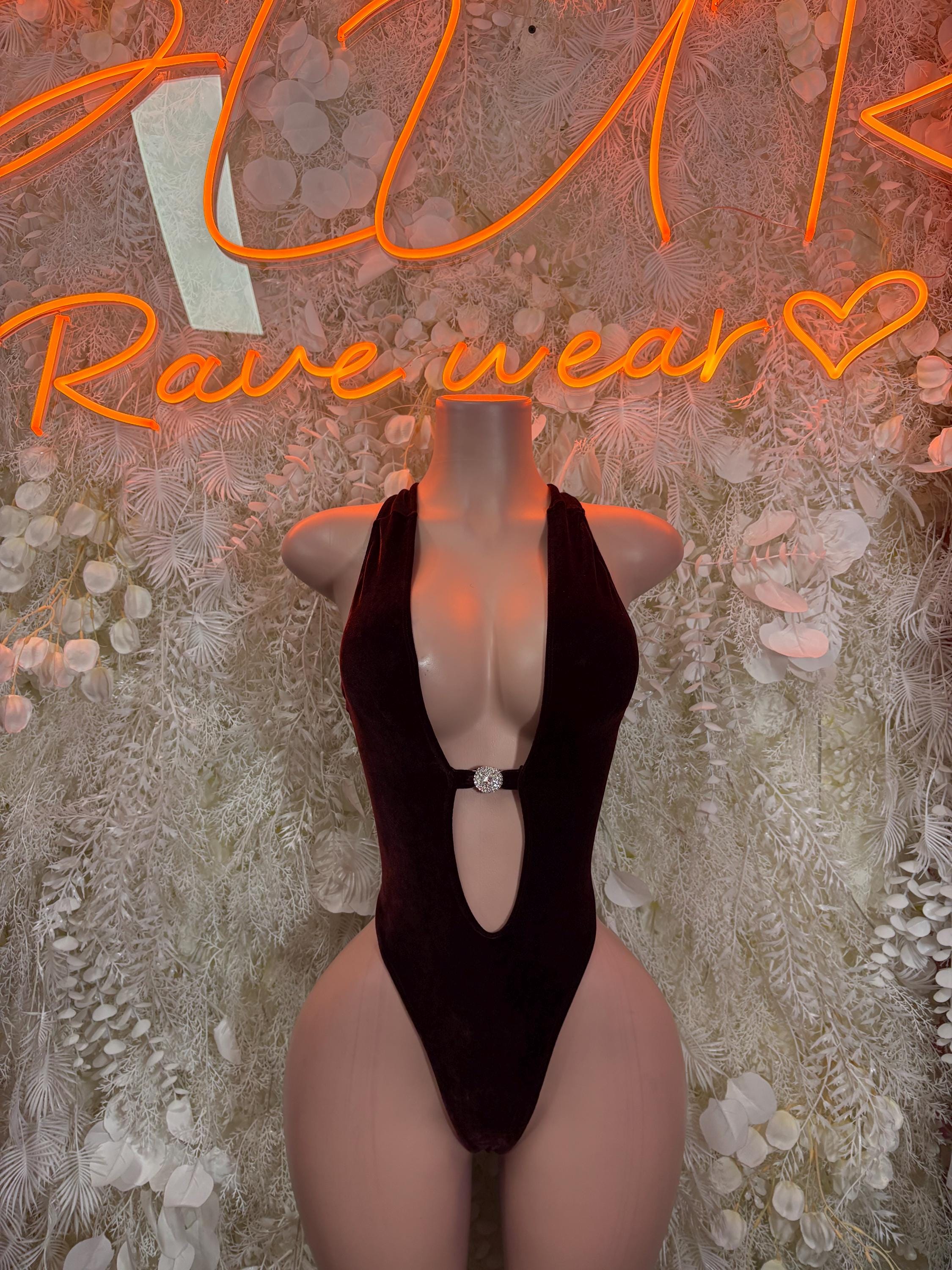 Black one-piece bodysuit with deep V neckline and chest cutout