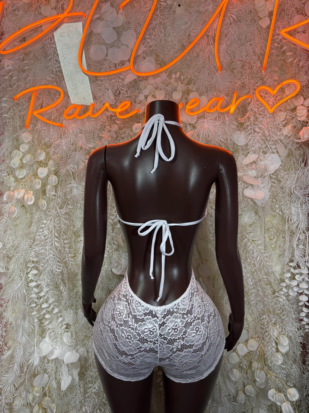 White lace fishnet bodysuit, halter straps with tied open-back detail