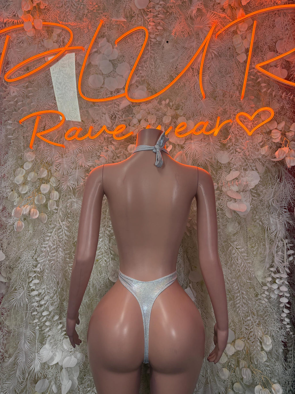Metallic silver backless bodysuit with tie-back bow and thong bottom