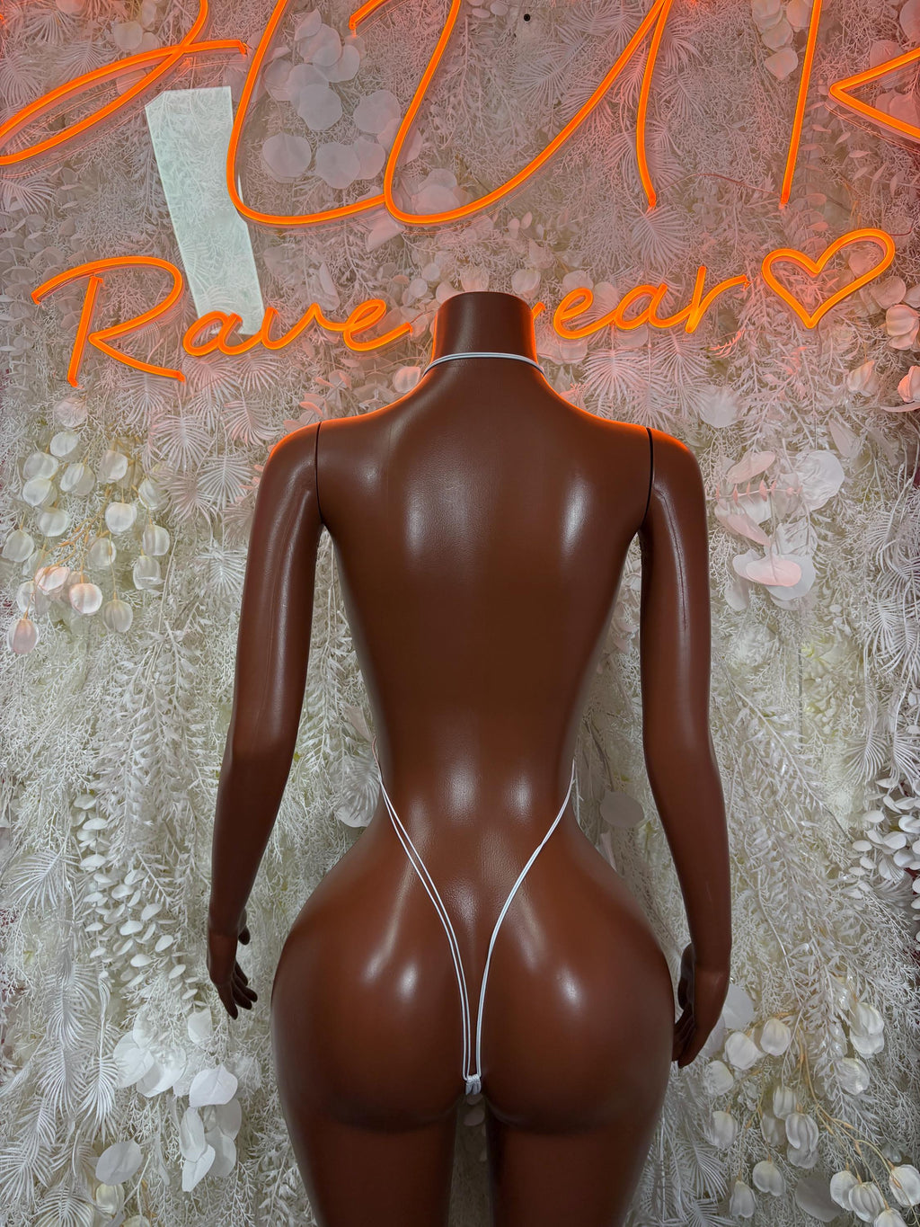 White backless one-piece dancewear bodysuit with lace back and thong cut