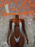 White lace one-piece dancewear bodysuit with V-neck front and thin shoulder straps