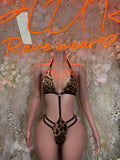 Leopard print rave bikini set with black tie triangle top and matching thong bottom