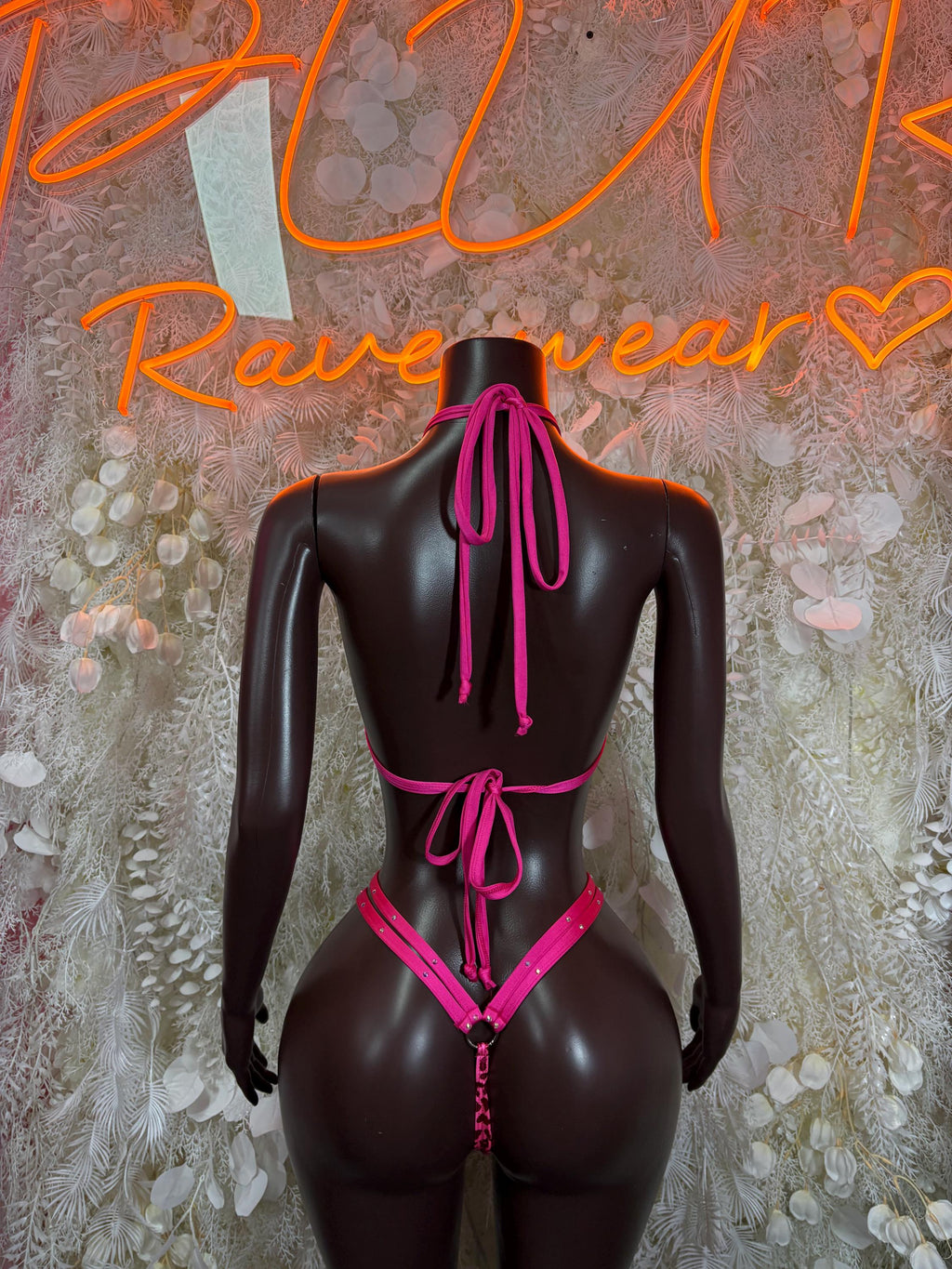 Leopard print pink bikini set with triangle top and crisscross back straps, back ties
