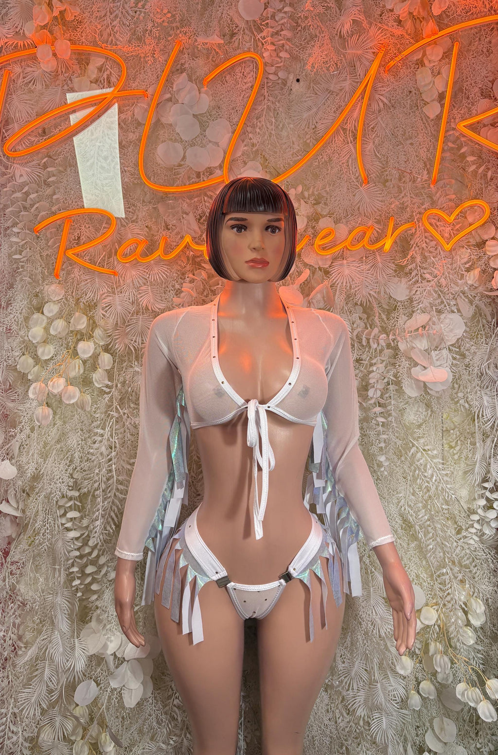 White metallic two-piece bikini set with tie-front top and matching high-cut bottoms