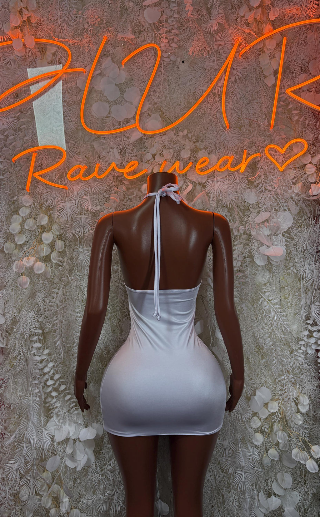 White one-piece dress back view with ruched straps
